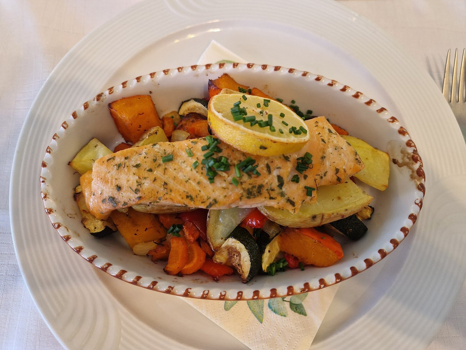 Baked salmon with vegetables, a DASH-style dinner for an atrial fibrillation diet