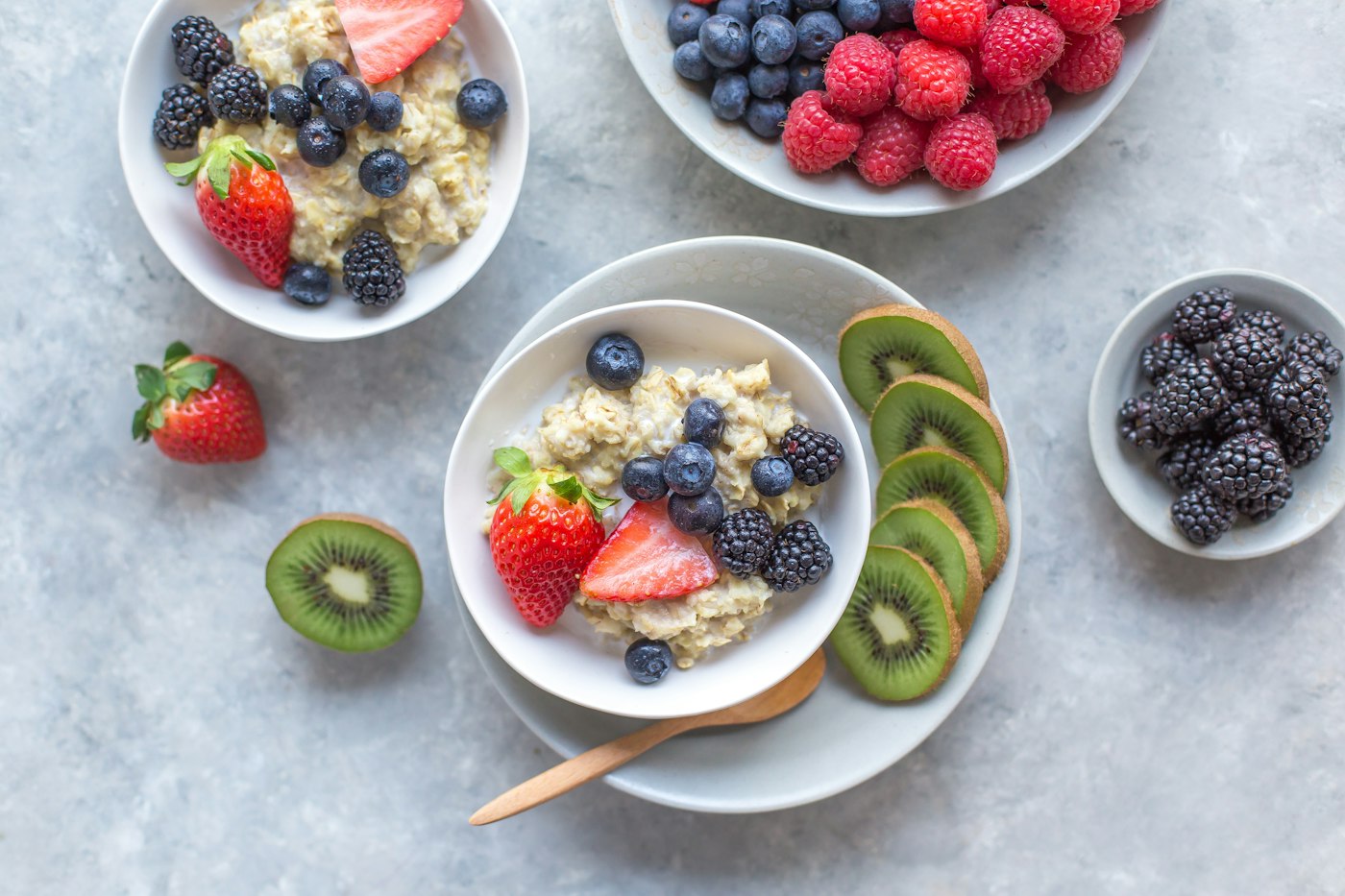Bowl of oatmeal with fruit — soluble fiber foods often included in a high cholesterol diet