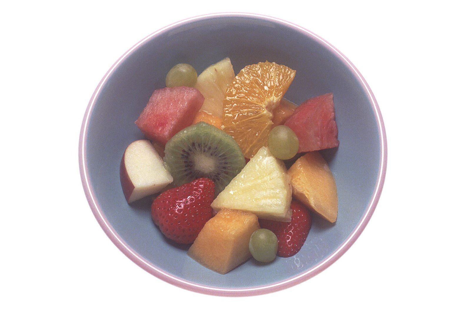 Fresh fruit salad illustrating everyday fiber and fluid habits after hemorrhoidectomy
