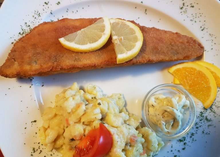 Baked fish with potatoes as a B12-containing supportive dinner during pernicious anemia care