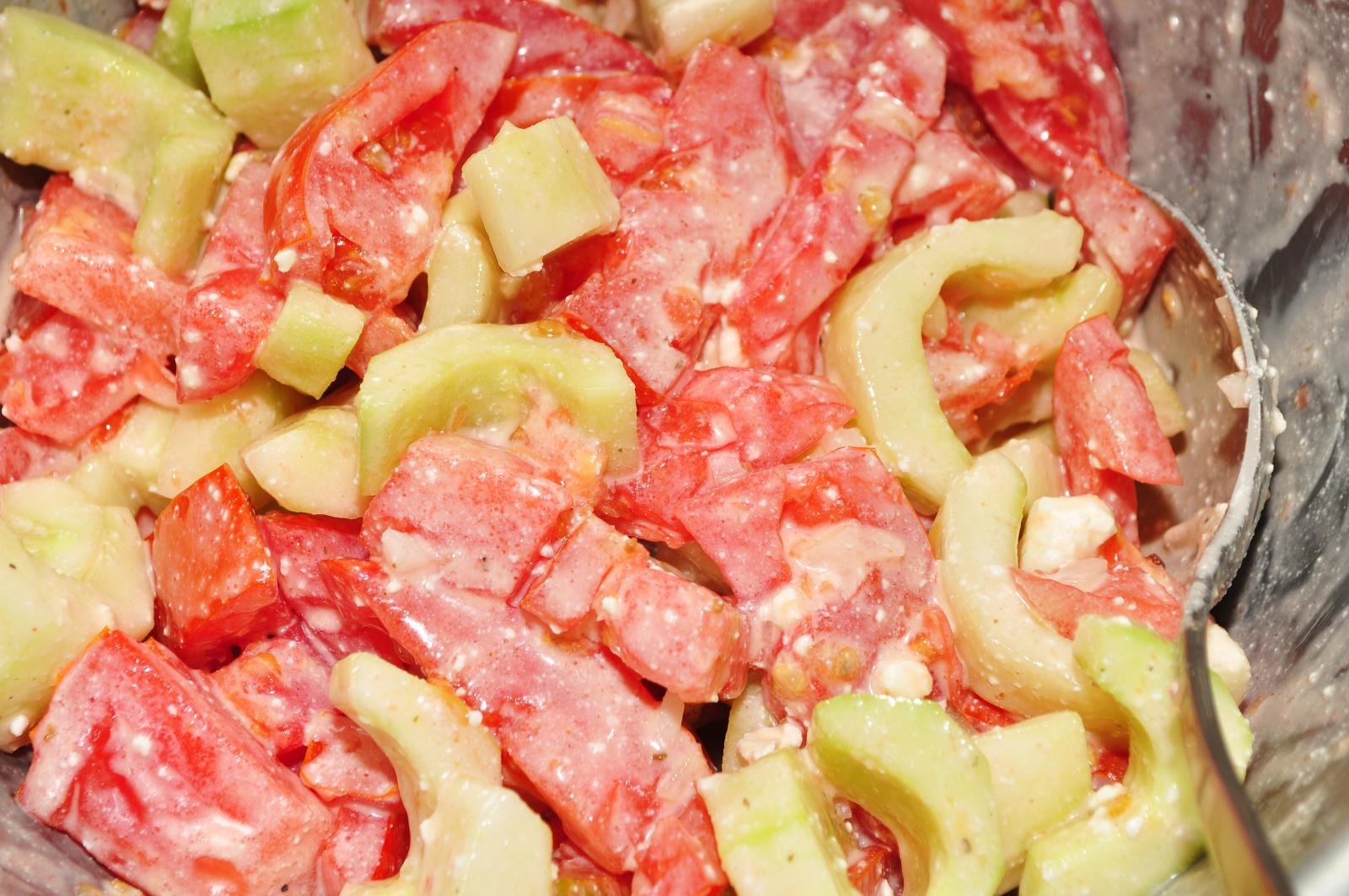 Cucumber tomato salad illustrating produce-forward plates after vein treatment