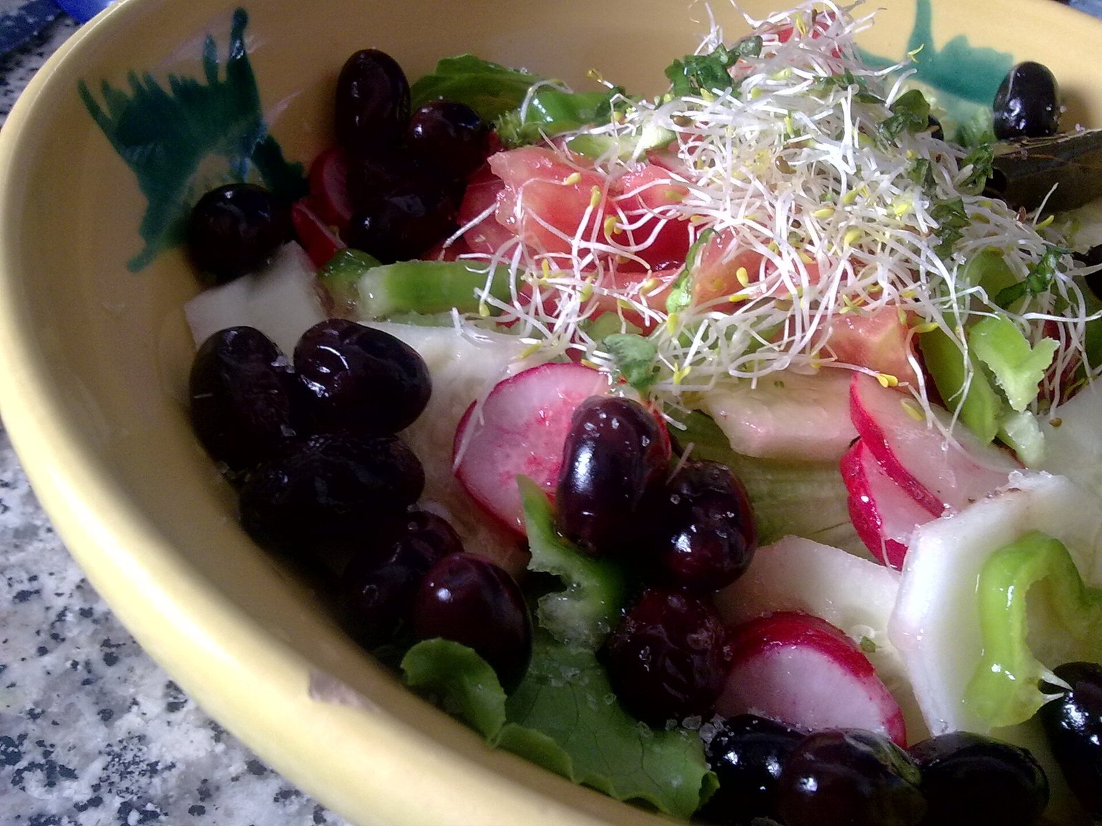 Romaine salad with cucumber, tomato, olives and olive oil for a heart-aware CAD side