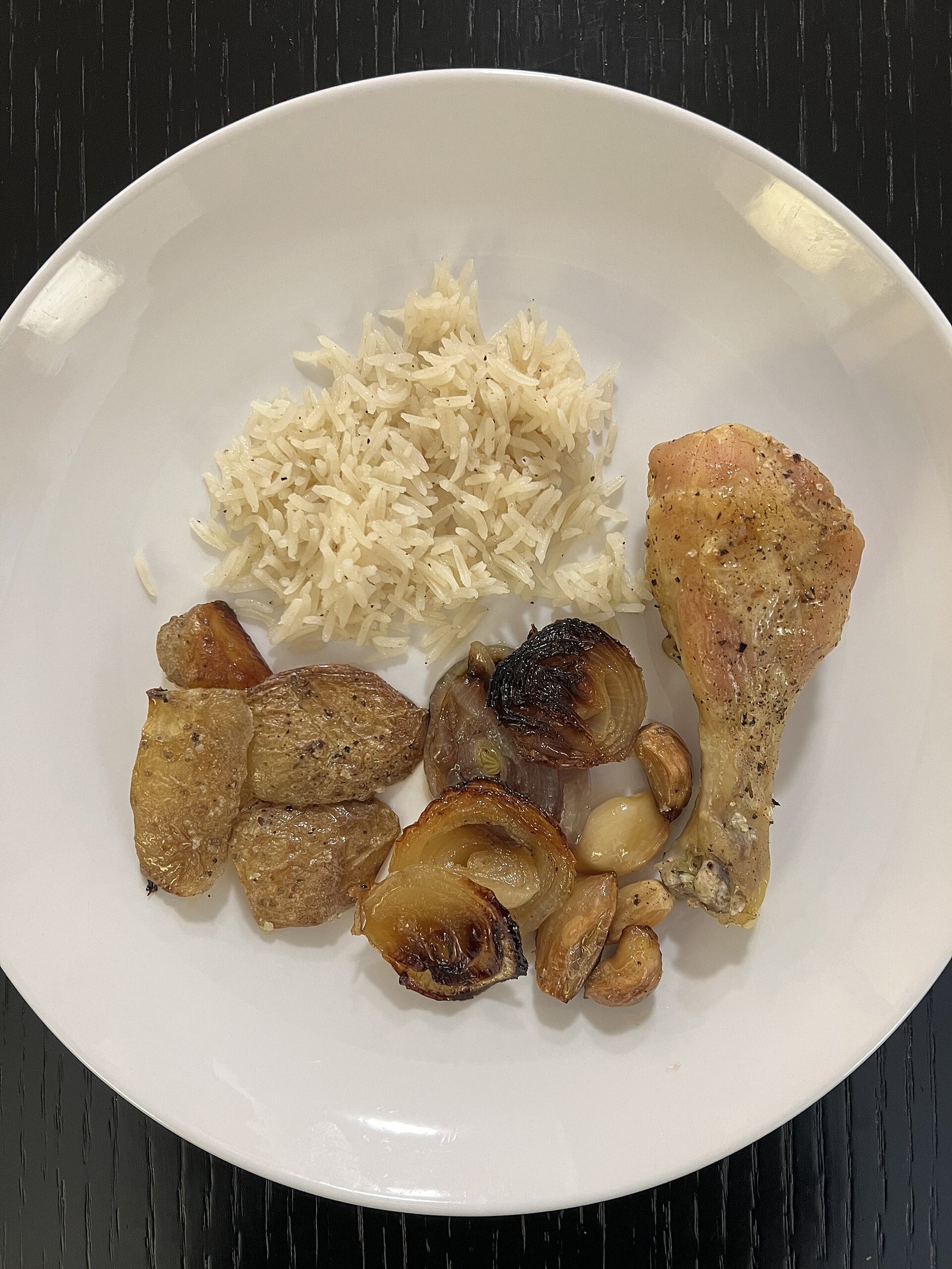 Oven-baked chicken with potatoes and rice as a lower-fat dinner finished well before bedtime for reflux comfort