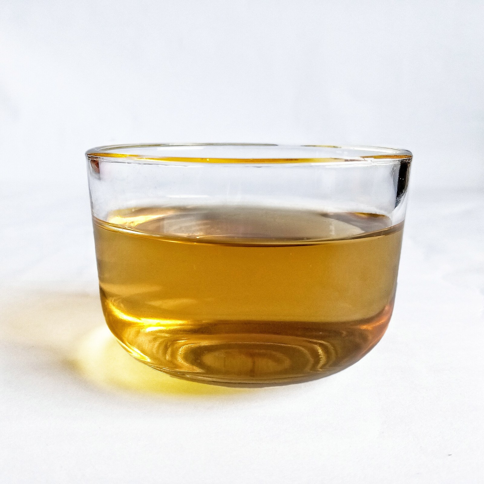 Herbal tea cup as a lower-stimulant drink option while reviewing caffeine with a clinician