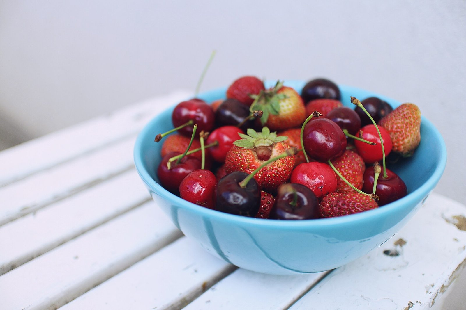 Bowl of fresh fruit for skin-on fiber snacks that may support softer stools