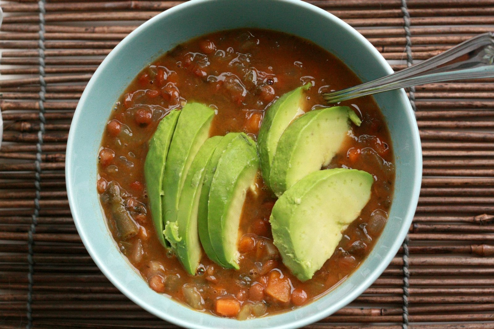 Lentil and vegetable soup with avocado as a fiber-forward lunch during disc recovery