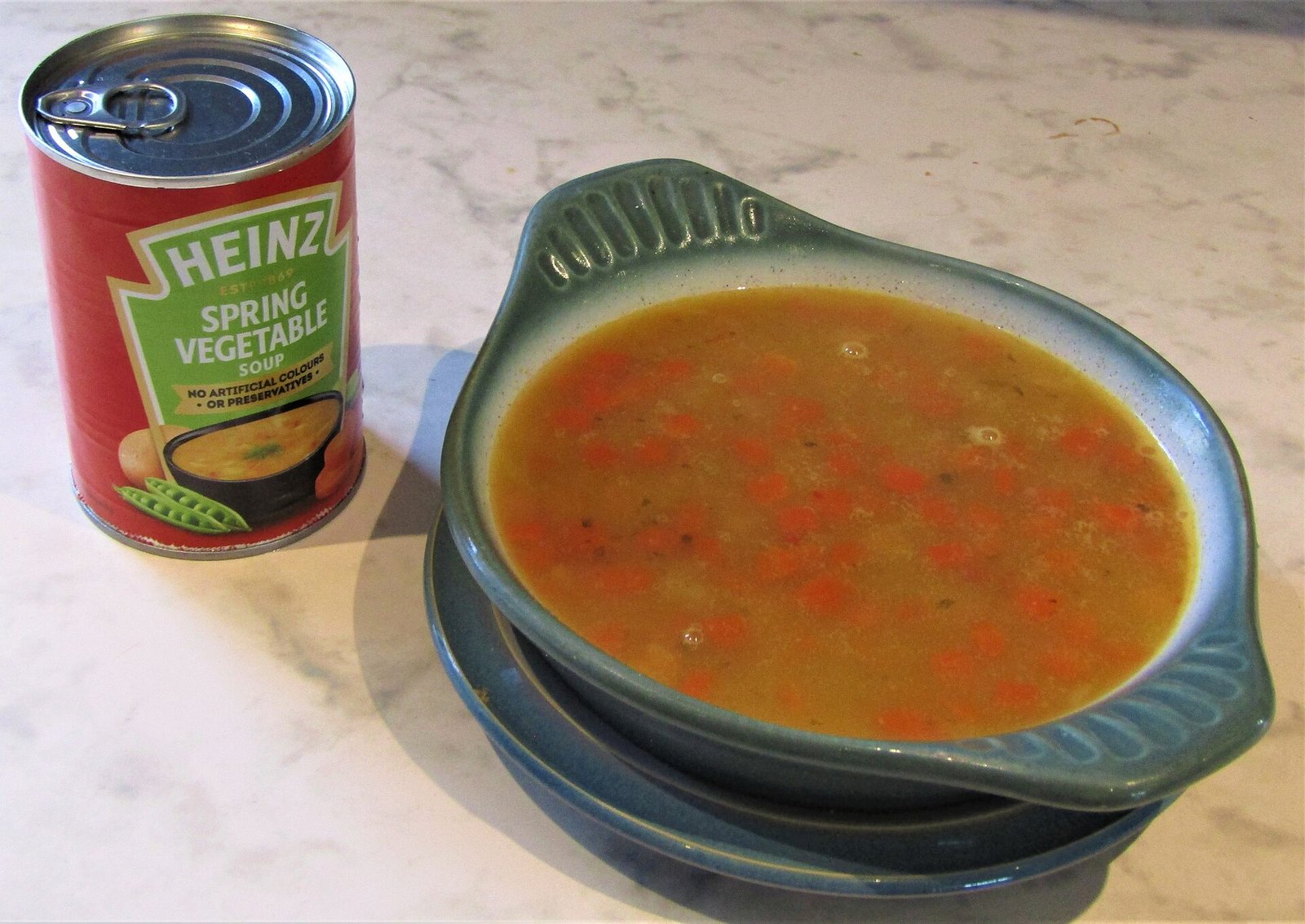 Bowl of vegetable soup as a warm not scalding easy meal during oral thrush