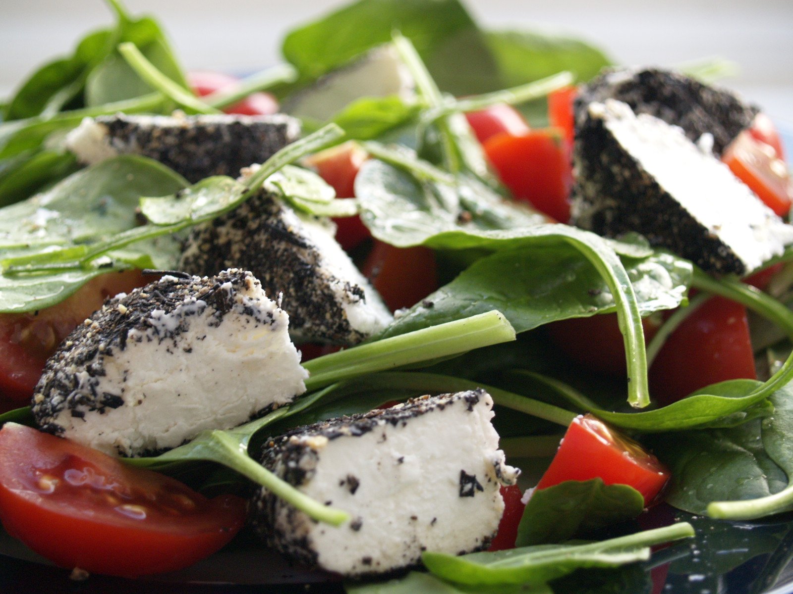 Spinach salad with nuts as a produce-forward lunch template during neuropathy self-care