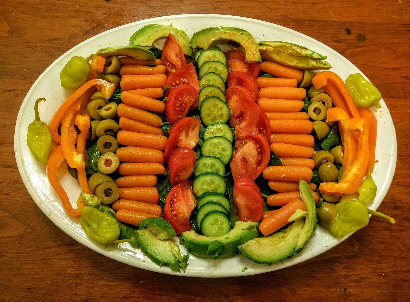 Composed tomato and cucumber salad as a vegetable-forward potassium lunch pattern