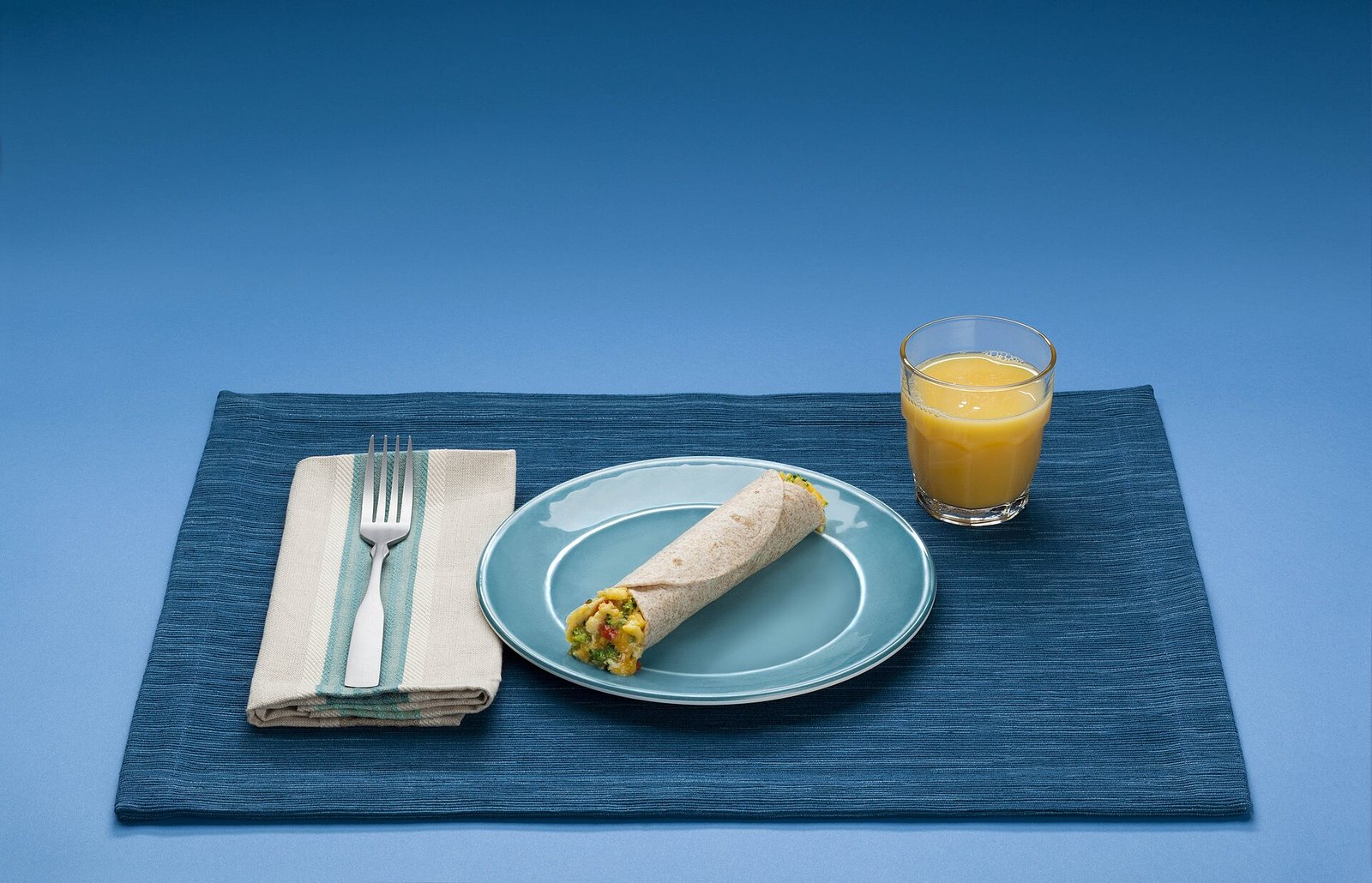 MyPlate-style breakfast meal including dairy and protein foods with B12 potential
