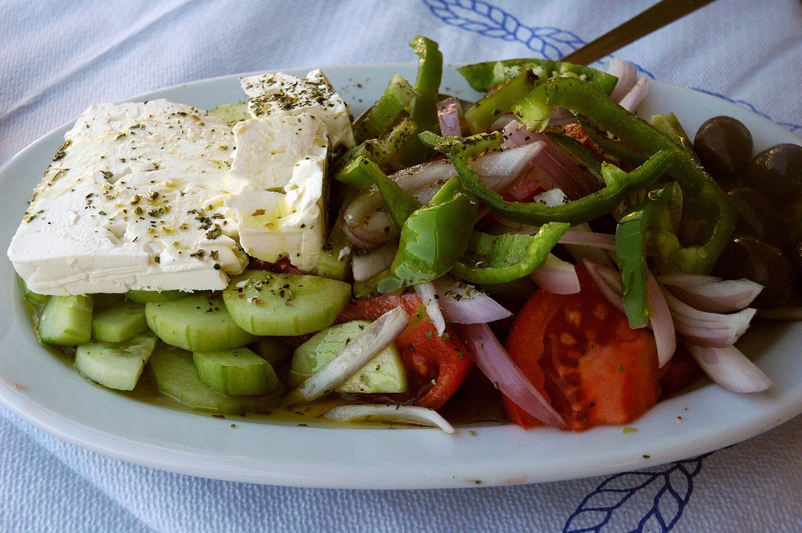 Greek salad illustrating everyday vegetable-forward sides in a heart-healthy pattern after pacemaker implantation