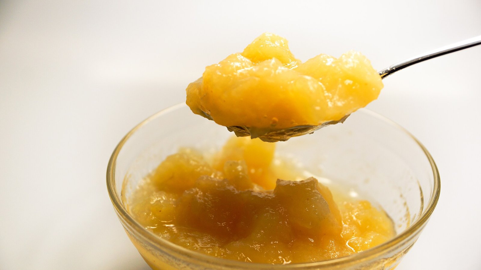Applesauce illustrating soft fiber-friendly snacks after rhinoplasty