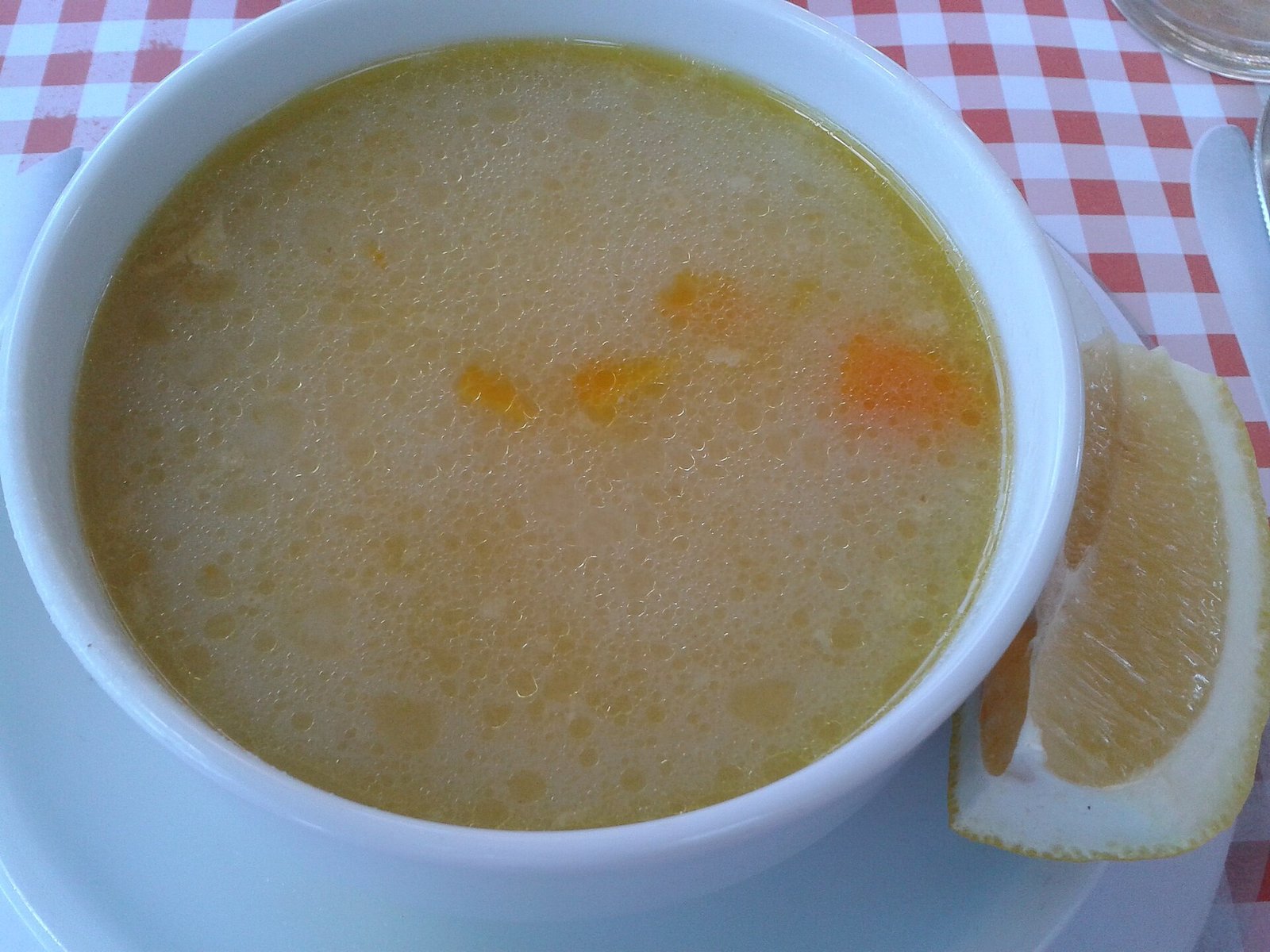 Chicken broth soup illustrating gentle warm fluids during early septoplasty recovery