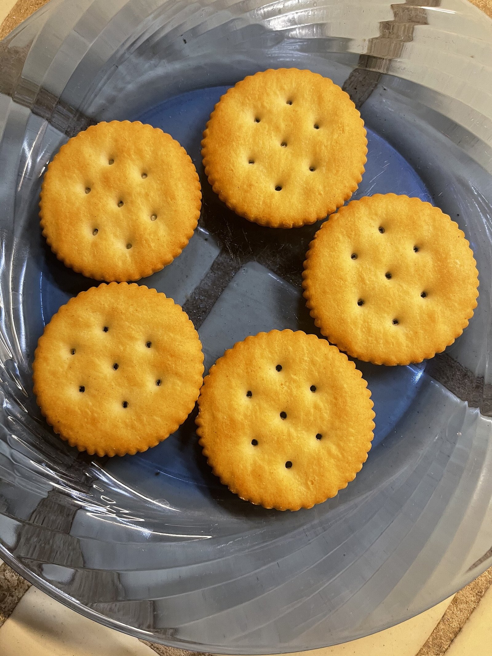 Crackers on a plate as a bedside morning sickness comfort food
