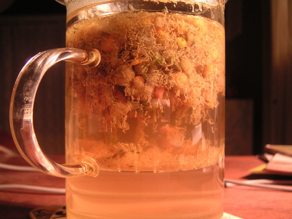 Glass of caffeine-free chamomile tea as an evening drink in a fibromyalgia sleep routine