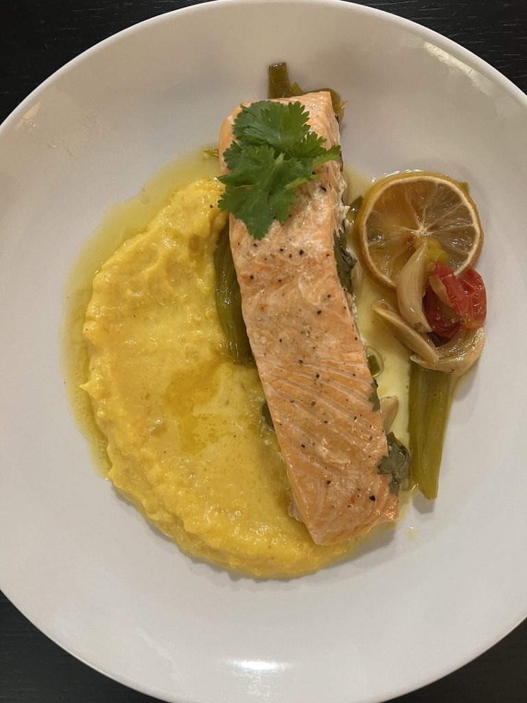Grilled salmon with vegetables supporting protein during frozen shoulder rehab