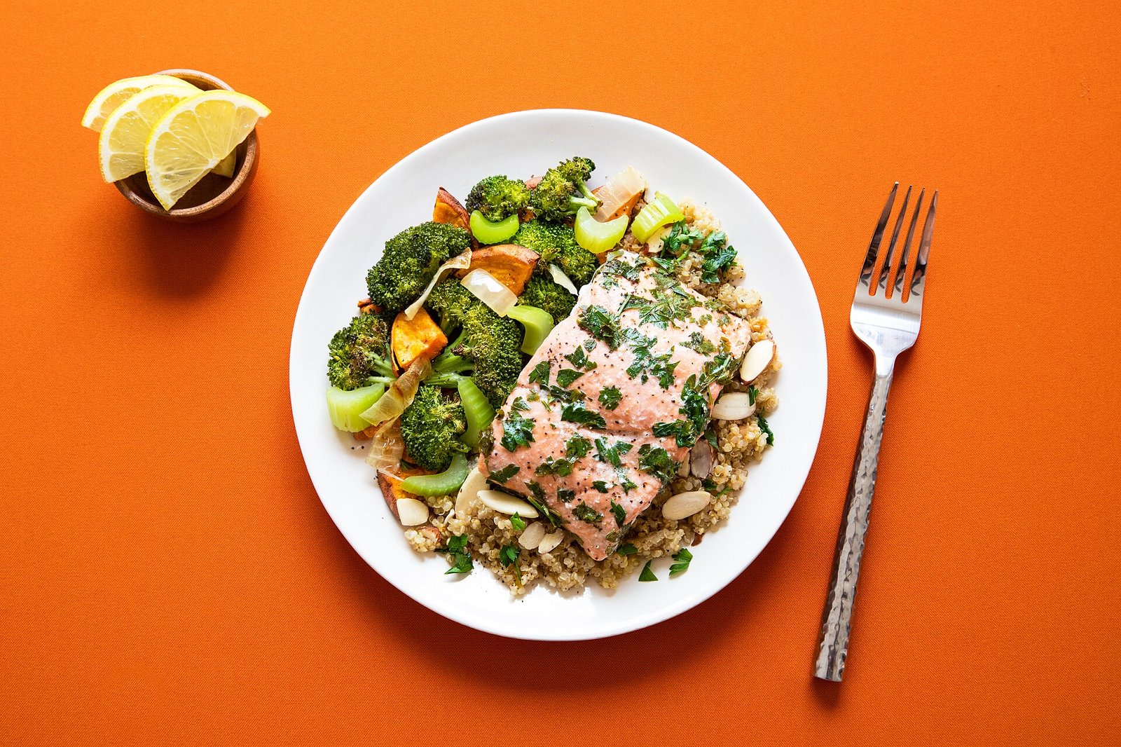 Multiple sclerosis diet plate: salmon with broccoli and sweet potato on quinoa, a Mediterranean-style meal