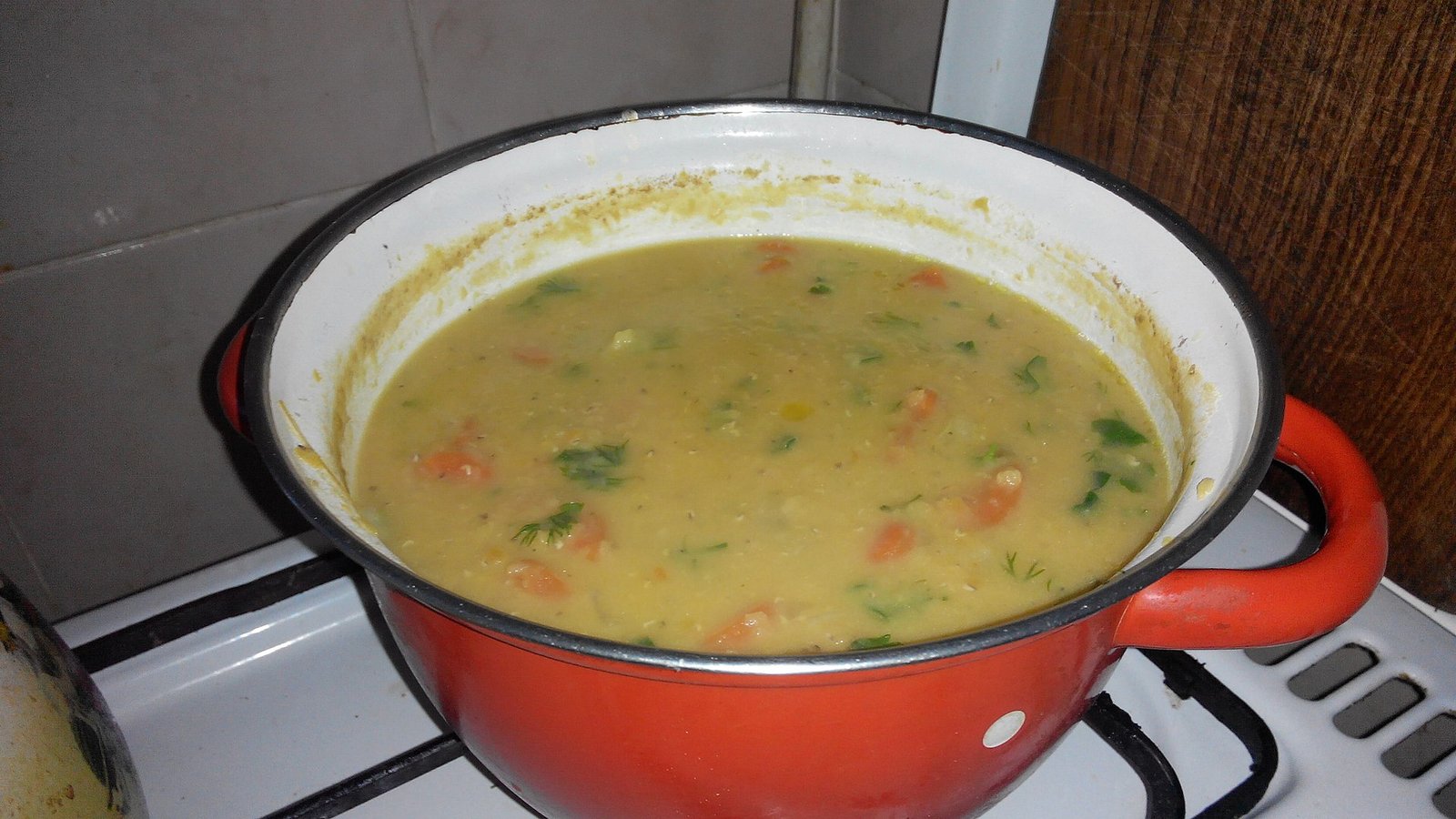 Pot of lentil and vegetable soup, a filling bean-based meal for a PCOS diet